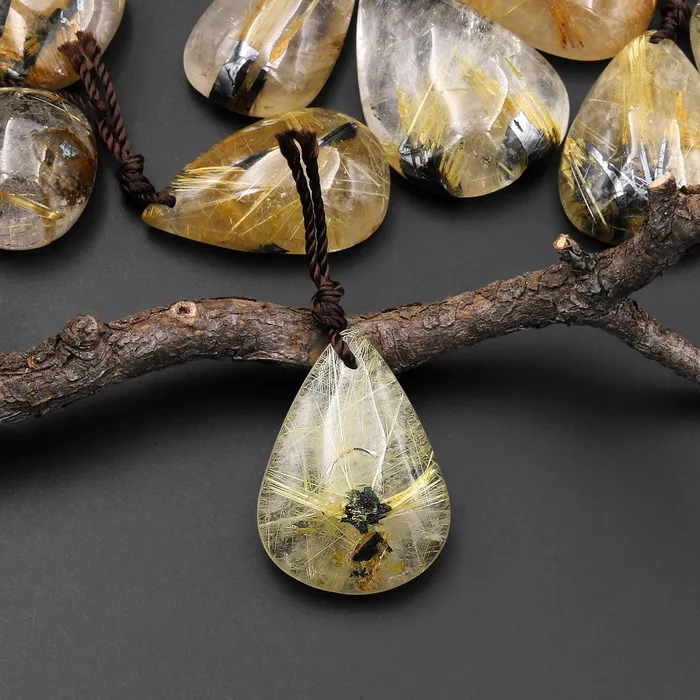 Natural Titanium Golden Hematite Rutilated Quartz Teardrop Pendant A1 Intrinsic Trading Necklaces Natural Titanium Golden Hematite Rutilated Quartz Teardrop Pendant A1 Intrinsic Trading Necklaces