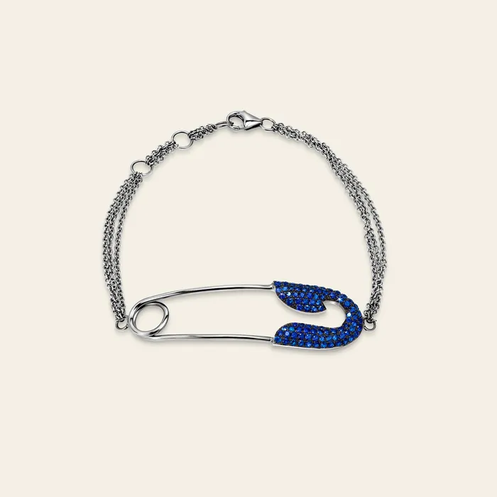 Securus Sapphire Bracelet Hand crafted in 18k white gold and set with highquality round brilliant cut blue sapphires Bracelets Securus Sapphire Bracelet Hand crafted in 18k white gold and set with highquality round brilliant cut blue sapphires Bracelets